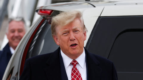 Former U.S. President and Republican presidential candidate Donald Trump reacts after arriving at Aberdeen International Airport in Aberdeen, Scotland, Britain May 1, 2023. 