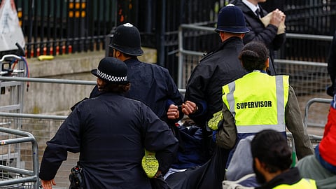 Police detain a protester on the day of Britain's King Charles and Queen Camilla's coronation ceremony, in London, Britain May 6, 2023. 