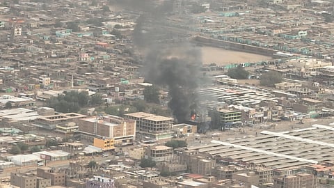 A view shows plumes of smoke and fire at an Omdurman National Bank branch, in Omdurman, Sudan, May 11, 2023 in this screen grab taken from a video obtained by Reuters. 