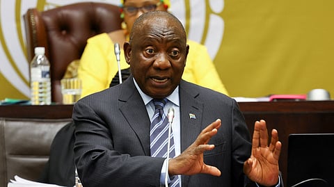 FILE PHOTO: South African President Cyril Ramaphosa responds to questions in parliament surrounding cash allegedly kept on his private farm, and on frequent power outages, as South Africa's struggling power utility Eskom implements regular power cuts, in Cape Town, South Africa, September 29, 2022. 