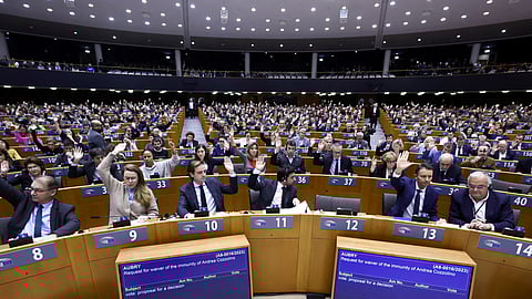 FILE PHOTO: Members of the European Parliament vote on lifting immunity for Italian lawmaker Andrea Cozzolino and Belgian lawmaker Marc Tarabella, both of the centre-left Socialists and Democrats, who Belgian investigators want to question over a cash-for-influence corruption scandal, in Brussels, Belgium February 2, 2023. 