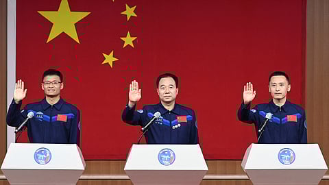 Astronauts Jing Haipeng, Zhu Yangzhu and Gui Haichao attend a press conference before the Shenzhou-16 spaceflight mission to China's space station, at Jiuquan Satellite Launch Center, near Jiuquan, Gansu province, China May 29, 2023. 
