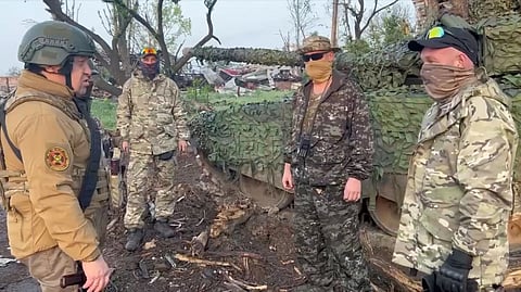 Founder of Wagner private mercenary group Yevgeny Prigozhin talks to Wagner fighters in the course of Russia-Ukraine conflict in Bakhmut, Ukraine, in this still image taken from video released May 25, 2023. 