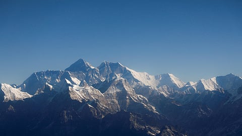 FILE PHOTO: Mount Everest, the world highest peak, and other peaks of the Himalayan range are seen through an aircraft window during a mountain flight from Kathmandu, Nepal January 15, 2020. 