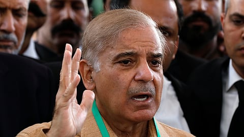 FILE PHOTO: Leader of the opposition Mian Muhammad Shahbaz Sharif, brother of ex-Prime Minister Nawaz Sharif, gestures as he speaks to the media at the Supreme Court of Pakistan in Islamabad, Pakistan April 5, 2022. 