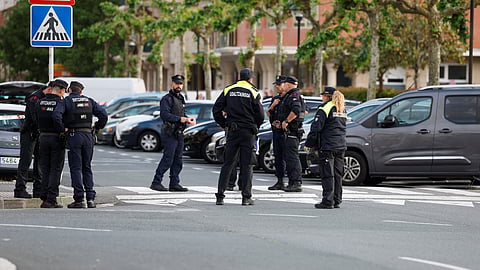 Police cordon off the area where a man and a woman died in a suspected bomb blast related to gender violence, according to the Basque regional security department, in Orio, northern Spain, May 16, 2023. 