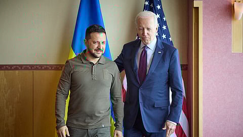 Ukraine's President Volodymyr Zelenskiy and U.S. President Joe Biden speak during the G7 leaders' summit in Hiroshima, Japan May 21, 2023. 
