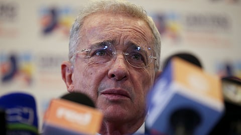 FILE PHOTO: Colombia's former president Alvaro Uribe reacts to the media after his meeting with President-elect Gustavo Petro in Bogota, Colombia June 29, 2022. 