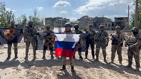 FILE PHOTO: Founder of Wagner private mercenary group Yevgeny Prigozhin makes a statement as he stand next to Wagner fighters in the course of Russia-Ukraine conflict in Bakhmut, Ukraine, in this still image taken from video released May 20, 2023. 