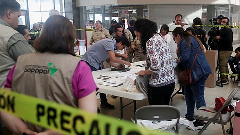 Ballots are counted by officials during the election day for governor of the State of Mexico, at a polling station in Toluca, Mexico, June 4, 2023. 