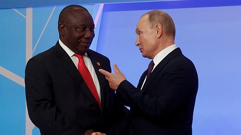FILE PHOTO: Russian President Vladimir Putin and South African President Cyril Ramaphosa during an official welcome ceremony for heads of states and governments of member-states of Russia-Africa Summit in the Black sea resort of Sochi, Russia, October 23, 2019. 