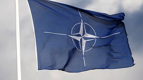 FILE PHOTO: A NATO flag flutters at the Tapa military base, Estonia April 30, 2023. 