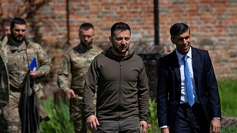 FILE PHOTO: Britain's Prime Minister, Rishi Sunak, walks Ukraine's President, Volodymyr Zelenskiy, to a waiting Chinook helicopter after meetings at Chequers on May 15, 2023 in Aylesbury, England.