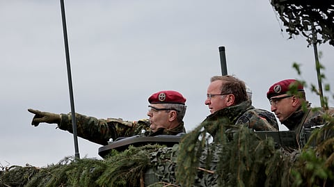FILE PHOTO: German Defence Minister Boris Pistorius, flanked by German Lieutenant General and Chief of the German Army Alfons Mais, visits a training site of German army Bundeswehr in Hammelburg, Germany May 16, 2023. 
