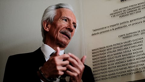 FILE PHOTO: Journalist Jose Ruben Zamora Marroquin, founder and president of El Periodico newspaper, talks with the media as he attends a court hearing in Guatemala City, Guatemala December 8, 2022. 