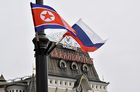 State flags of Russia and North Korea fly in a street near a railway station during the visit of North Korea's leader Kim Jong Un to Vladivostok, Russia April 25, 2019. 