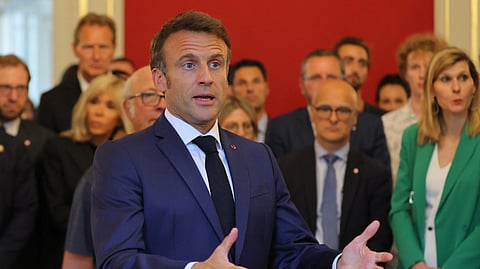 FILE PHOTO: French President Emmanuel Macron delivers a speech during a meeting with rescue forces at the Haute-Savoie prefecture, the day after several children and adults were injured in a knife attack at the Le Paquier park near the lake in Annecy, in the French Alps, France, June 9, 2023. 