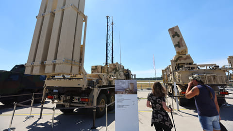 FILE PHOTO: Visitors take a look at the IRIS-T SLM, a German air defence system by Diehl, displayed at the ILA Berlin Air Show 2022 in Berlin, Germany June 22, 2022. 