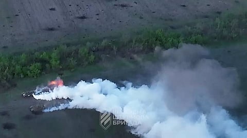 View of military vehicles as Ukrainian forces destroy Russian positions in direction of Bakhmut, near Klischiivka, Donetsk Region, Ukraine, in this screengrab taken from a video released on June 4, 2023. 