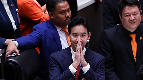 FILE PHOTO: Pita Limjaroenrat, leader of Thailand's Move Forward Party who failed to win parliamentary support to become prime minister, reacts at the parliament, in Bangkok, Thailand, July 13, 2023. 