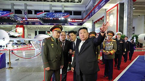North Korean leader Kim Jong Un and Russia's Defense Minister Sergei Shoigu visit an exhibition of armed equipment on the occasion of the 70th anniversary of the Korean War armistice in this image released by North Korea's Korean Central News Agency on July 27, 2023. 