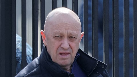 FILE PHOTO: Founder of Wagner private mercenary group Yevgeny Prigozhin leaves a cemetery before the funeral of a Russian military blogger who was killed in a bomb attack in a St Petersburg cafe, in Moscow, Russia, April 8, 2023. 