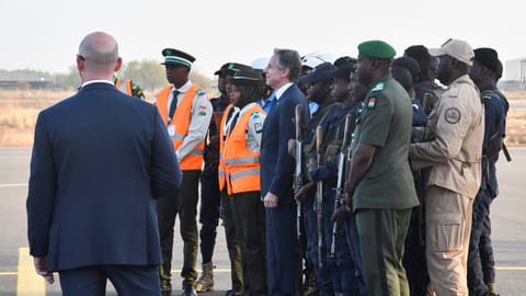 US Secretary of State Antony Blinken poses for a photograph with members of the Niger Defence and Security Forces before departing Niger at the Diori Hamani International Airport in Niamey, Niger, on March 17, 2023. 