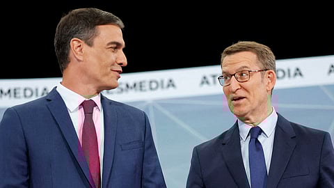 FILE PHOTO: Spanish People's Party candidate Alberto Nunez Feijoo and Spain's Prime Minister and Socialist candidate Pedro Sanchez talk before a televised debate ahead of snap election in Madrid, Spain, July 10, 2023. 