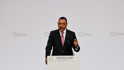 FILE PHOTO: President of Niger, Mohamed Bazoum delivers a speech during the opening session of the New Global Financial Pact Summit at the Palais Brogniart in Paris on June 22, 2023. 