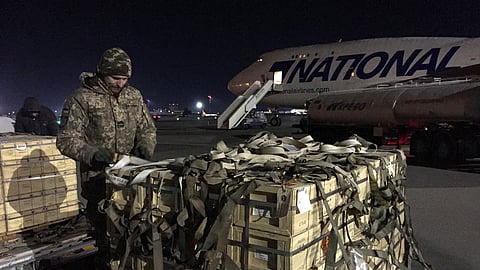 Military aid, delivered as part of the United States' security assistance to Ukraine, is unloaded from a plane at the Boryspil International Airport outside Kyiv, Ukraine February 13, 2022. 