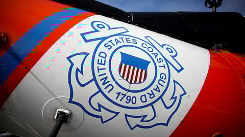 FILE PHOTO: The U.S. Coast Guard's logo is seen on an helicopter on the deck of the Coast Guard Cutter Hamilton at Port Everglades, in Fort Lauderdale, Florida, U.S. November 22, 2021. 