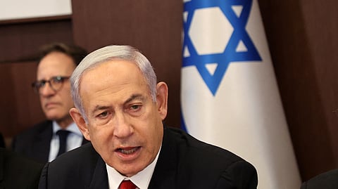 Israel's Prime Minister Benjamin Netanyahu attends the weekly cabinet meeting in his office in Jerusalem on July 9, 2023. 