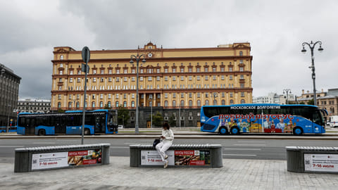 FILE PHOTO: A woman uses her mobile phone in front of the Federal Security Service (FSB) building on Lubyanka Square in Moscow, Russia, June 24, 2023. 
