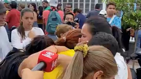 People react outside Hospital Rodriguez Zambrano de Manta Ecuador, after the mayor of the Ecuadorian Pacific port city of Manta Agustin Intriago had been shot dead, in Manta, Ecuador July 23, 2023, in this screengrab obtained from a social media video. 