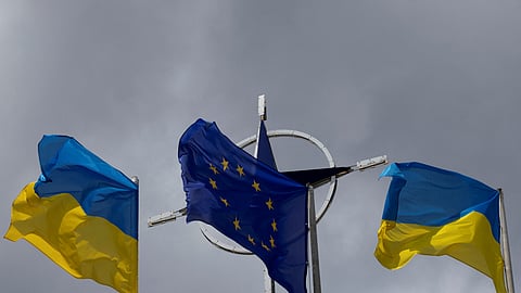 National flags of Ukraine and European Union rise in front of the NATO emblem, amid Russia's attack on Ukraine, in central Kyiv, Ukraine July 11, 2023. 