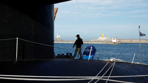 FILE PHOTO: A crew patrols on the deck of U.S. Ballistic Missile Submarine USS Kentucky anchored at Busan Naval Base, in Busan, South Korea, July 19, 2023. 