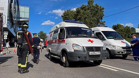 Emergency services members work outside the shopping mall Vremena Goda (The Seasons) following the burst of a pipe carrying boiling hot water in Moscow, Russia, July 22, 2023. 