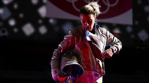 FILE PHOTO: Tokyo 2020 Olympics - Fencing - Women's Individual Sabre - Last 32 - Makuhari Messe Hall B - Chiba, Japan - July 26, 2021. Olga Kharlan of Ukraine reacts after competing 