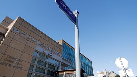 FILE PHOTO: A newly installed direction sign "Donetsk People's Republic Square" is seen in front of the U.S. embassy in Moscow, Russia June 22, 2022. 