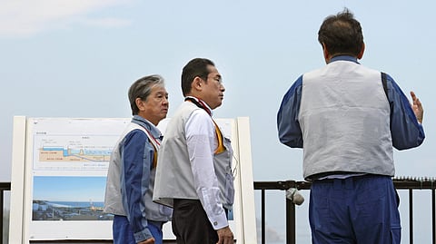Japan's Prime Minister Fumio Kishida visits the tsunami-crippled Fukushima Daiichi nuclear power plant in Okuma town, Fukushima prefecture, Japan August 20, 2023, in this photo released by Kyodo. 
