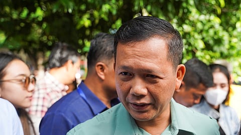 Hun Manet, son of Cambodia's Prime Minister Hun Sen is seen at a polling station on the day of Cambodia's general election, in Phnom Penh, Cambodia, July 23, 2023. 