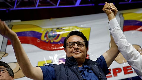 FILE PHOTO: Ecuadorean presidential candidate Fernando Villavicencio waves an Ecuadorian flag as he attends a rally in Quito, Ecuador August 9, 2023. 