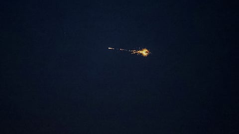 An explosion of a drone is seen in the sky over the city during a Russian drone strike, amid Russia's attack on Ukraine, in Kyiv, Ukraine August 2, 2023. 