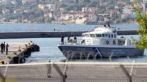 A Hellenic Coast Guard vessel with rescued migrants onboard, prepares to moor at the port of Mytilene, following a shipwreck in which four migrants drowned, off the island of Lesbos, Greece, August 28, 2023. 
