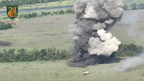 Plumes of smoke erupt as Ukrainian unit breach mine defences as part of a southern counteroffensive, near Hulyaipole, in Zaporizhzhia region, Ukraine, in this screen grab obtained from a handout video released on August 27, 2023. 