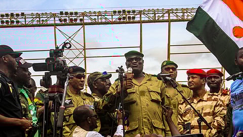 Members of a military council that staged a coup in Niger attend a rally at a stadium in Niamey, Niger, August 6, 2023. 