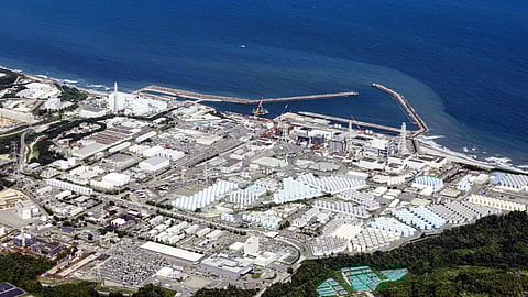 FILE PHOTO: An aerial view shows the Fukushima Daiichi nuclear power plant, which started releasing treated radioactive water into the Pacific Ocean, in Okuma town, Fukushima prefecture, Japan August 24, 2023, in this photo taken by Kyodo. 