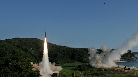 FILE PHOTO: United States and South Korean troops utilizing the Army Tactical Missile System (ATACMS) and South Korea's Hyunmoo Missile II, fire missiles into the waters of the East Sea, off South Korea, July 5, 2017. 