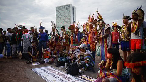 FILE PHOTO: Brazilian indigenous peoples gather as the Supreme Court on weighing the constitutionality of laws to limit the ability of Indigenous peoples to win protected status for ancestral lands, in Brasilia, Brazil August 30, 2023. 