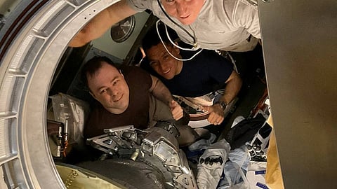 ISS crew, formed of Roscosmos cosmonauts Sergey Prokopyev, Dmitry Petelin and NASA astronaut Frank Rubio, pose for a picture before undocking of the Soyuz MS-23 space capsule as they leave the International Space Station and head for a parachute-assisted landing on the steppe of Kazakhstan, September 27, 2023. 